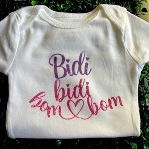 Size 3-6 months Selena baby onsie